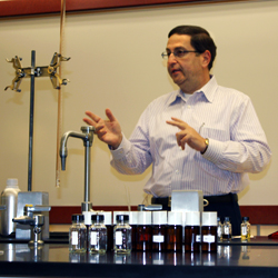 Phot oof Norman Appel in a chemistry lab.