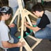 Photo of SUNY Plattsburgh stduents building a working trebuchet