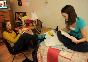 Photo of SUNY Plattsburgh students in dorm room