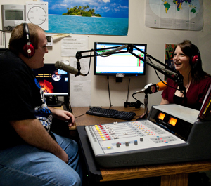 Photo of Brian Smith and Abigail Curran on air at WARP radio station