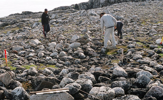 Photo of archaeologists working on a Maritime Archaic dig site on the coast of Labrador Photo of archaeologists working on a Maritime Archaic dig site on the coast of Labrador