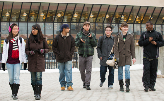 Photo of SUNY Plattsburgh students walking in front of Feinberg Library Photo of SUNY Plattsburgh students walking in front of Feinberg Library