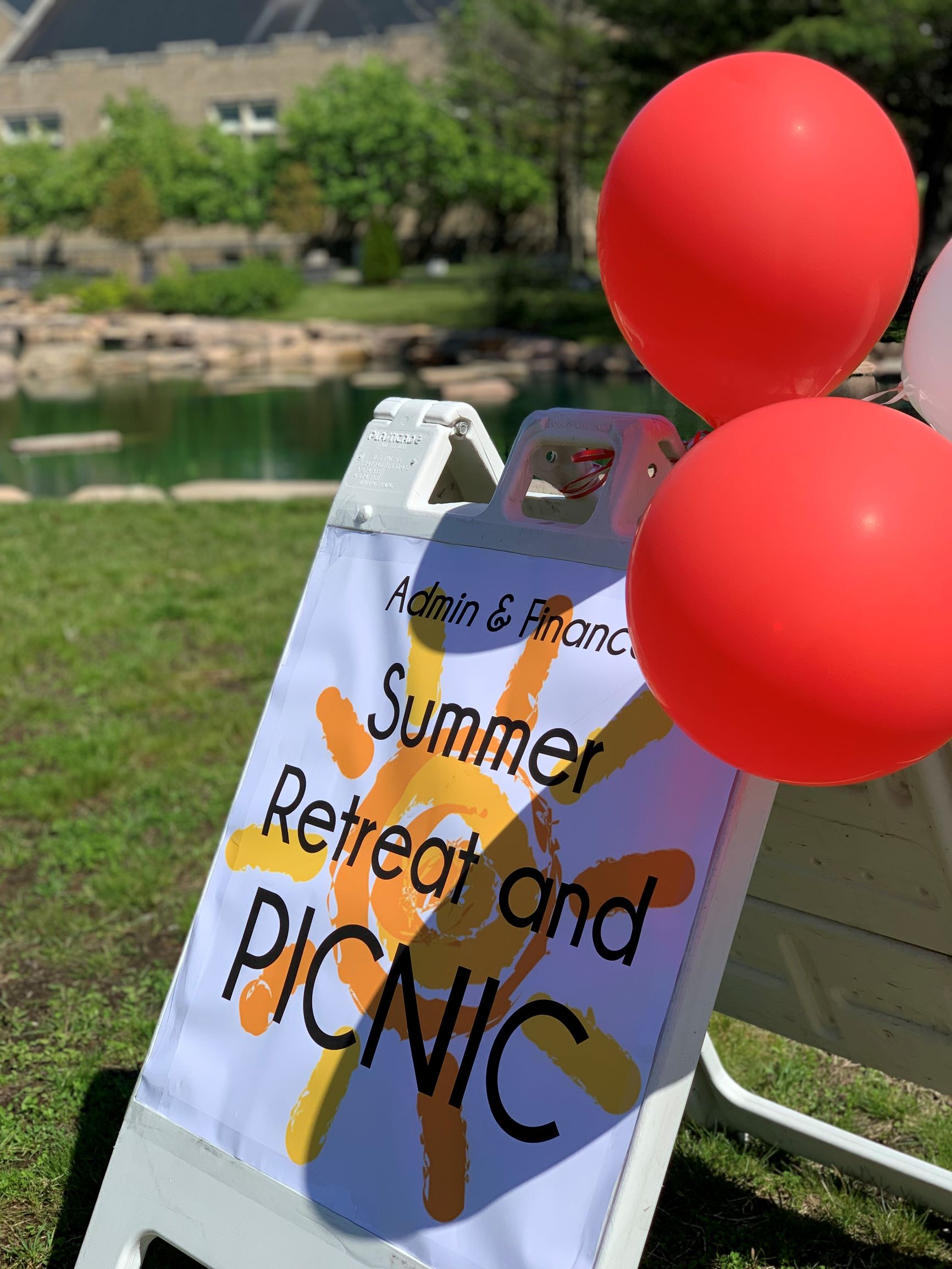 Retreat and Picnic Sign with balloons