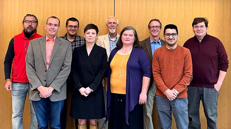 Group portrait of the economics and finance faculty at SUNY Plattsburgh