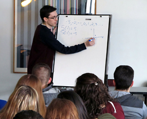 Bradley Johnson, a senior at Plattsburgh State, explains the Gaussian integers during his Math Day talk