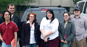 Photo of students in the parking lot at the conference