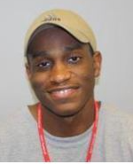 photo of an African-presenting young man in a hat