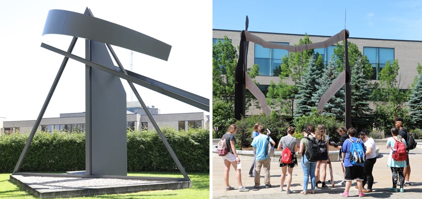 Image of visitors looking at sculptures in the park