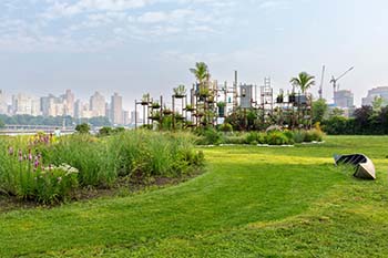 Photograph of a green space overlooking Manhattan: "Ebb of a Spring Tide’s Water Clock"