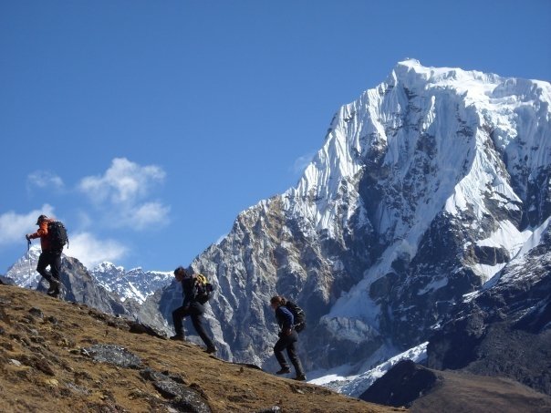 Student hike across a mountain ridge in Nepal