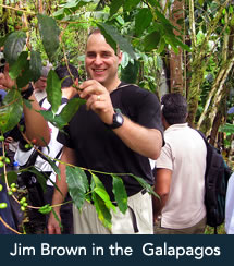 Photo of SUNY Plattsburgh alumni Jim Brown working with students in the Galapogos