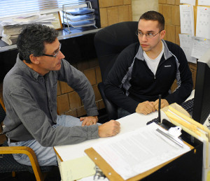 SUNY Plattsburgh faculty member Shawn Murphy talking to member of Cardinal Points