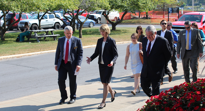 Photo of new Chancellor Kristina Johnson touring the campus