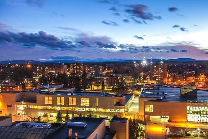 Photo of campus skyline at dusk by konradodh