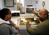 Dexter Criss talking to a student