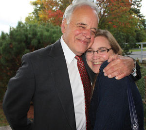 Photo of Dr. David Mowry hugging student