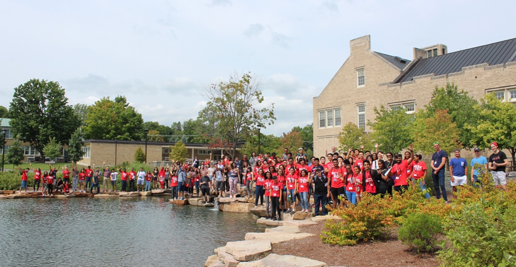 international students at pond