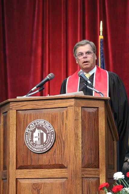 unrein at podium